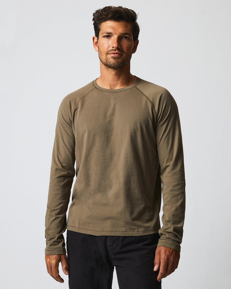 Stay cozy and fashionable with the L/S Sueded Cotton Crew in Moss Green. Shop now!