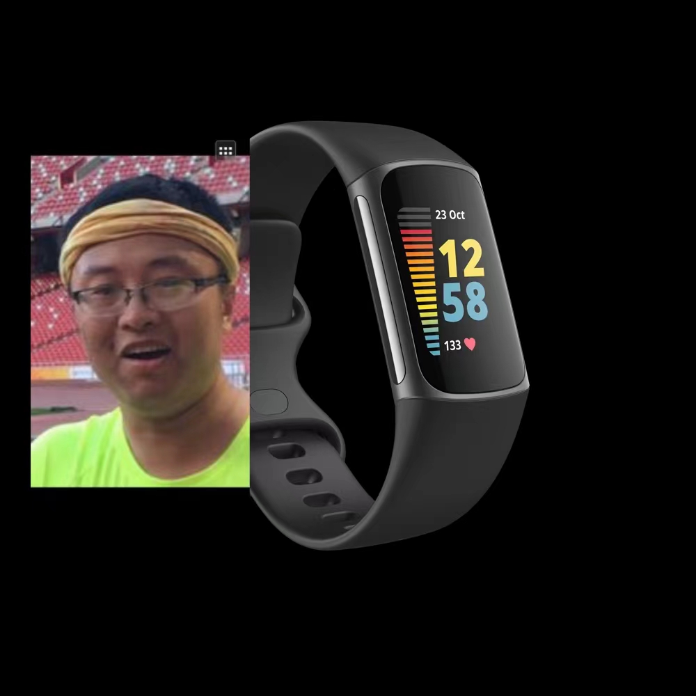 a man is smiling with Fitbit Charge5